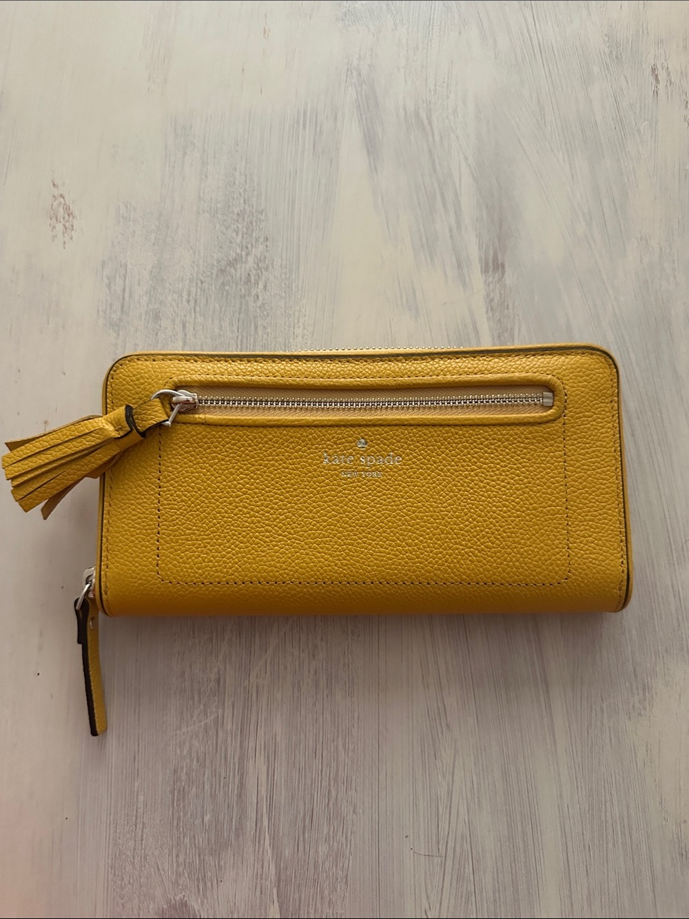 kate spade Bright Yellow Leather Tassel Zip Wallet